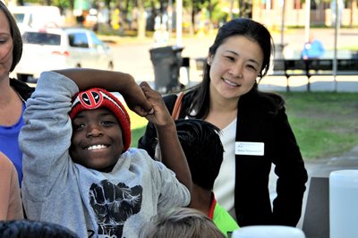 Chair Tchourumoff with kids at the Children's Water Festival.